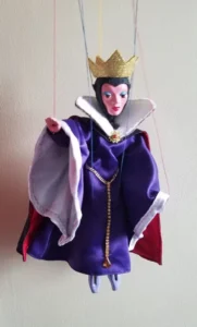 Evil Queen fwearing purple and red robe and gown and gold crown